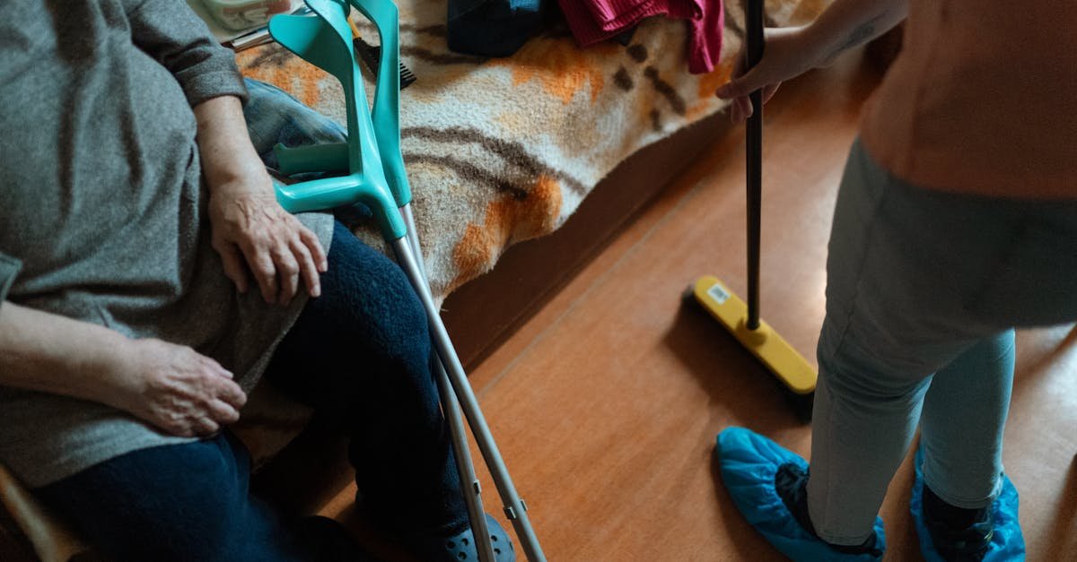 A caregiver assisting an older adult at home, illustrating in home senior care cost considerations
