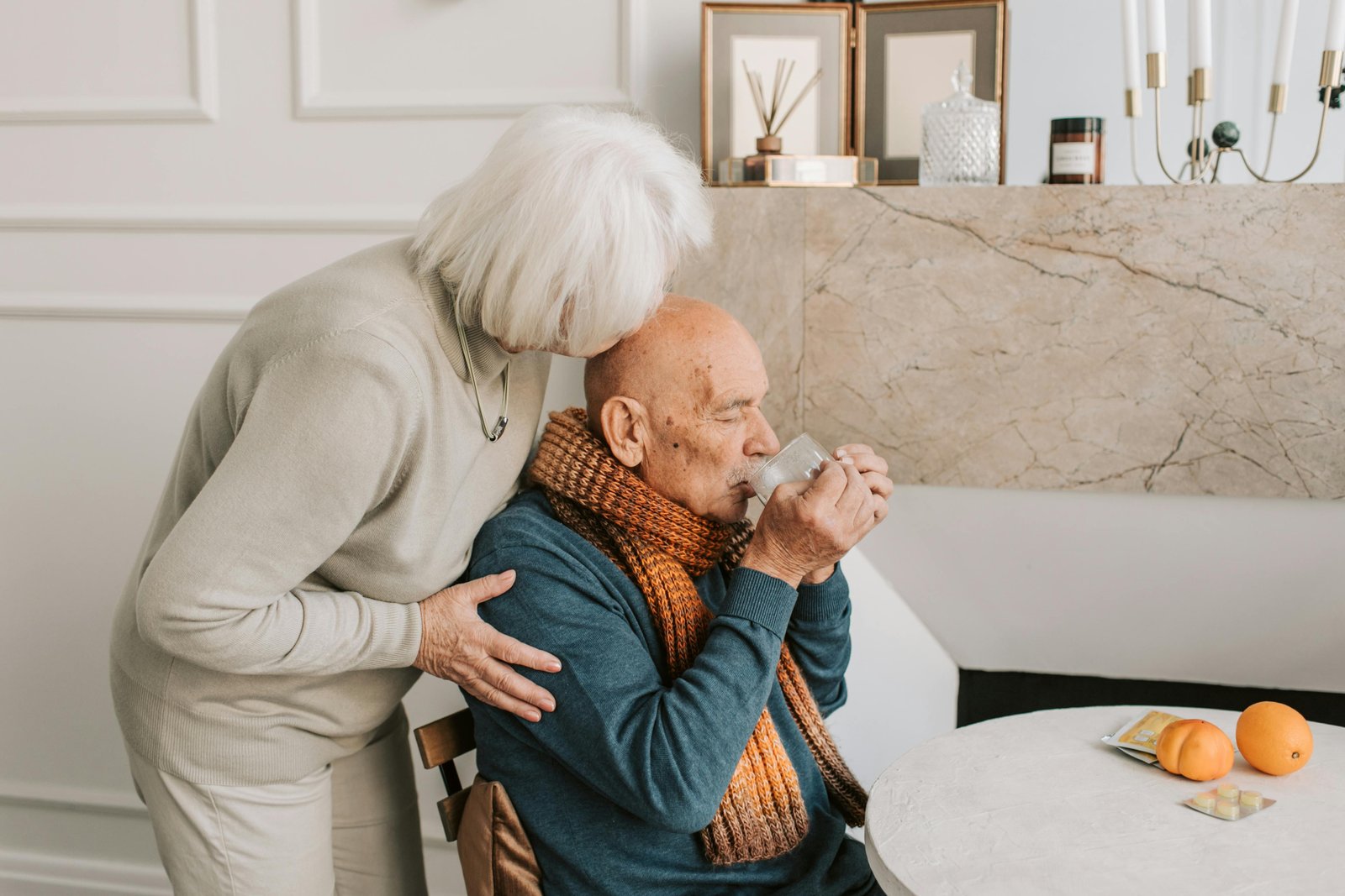 A senior couple reviewing Medigap coverage options together at a kitchen table