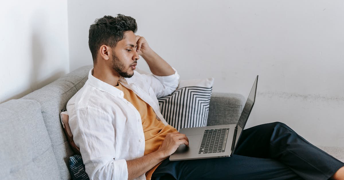 A self-employed person comparing health insurance for self employed plan options on a laptop at home