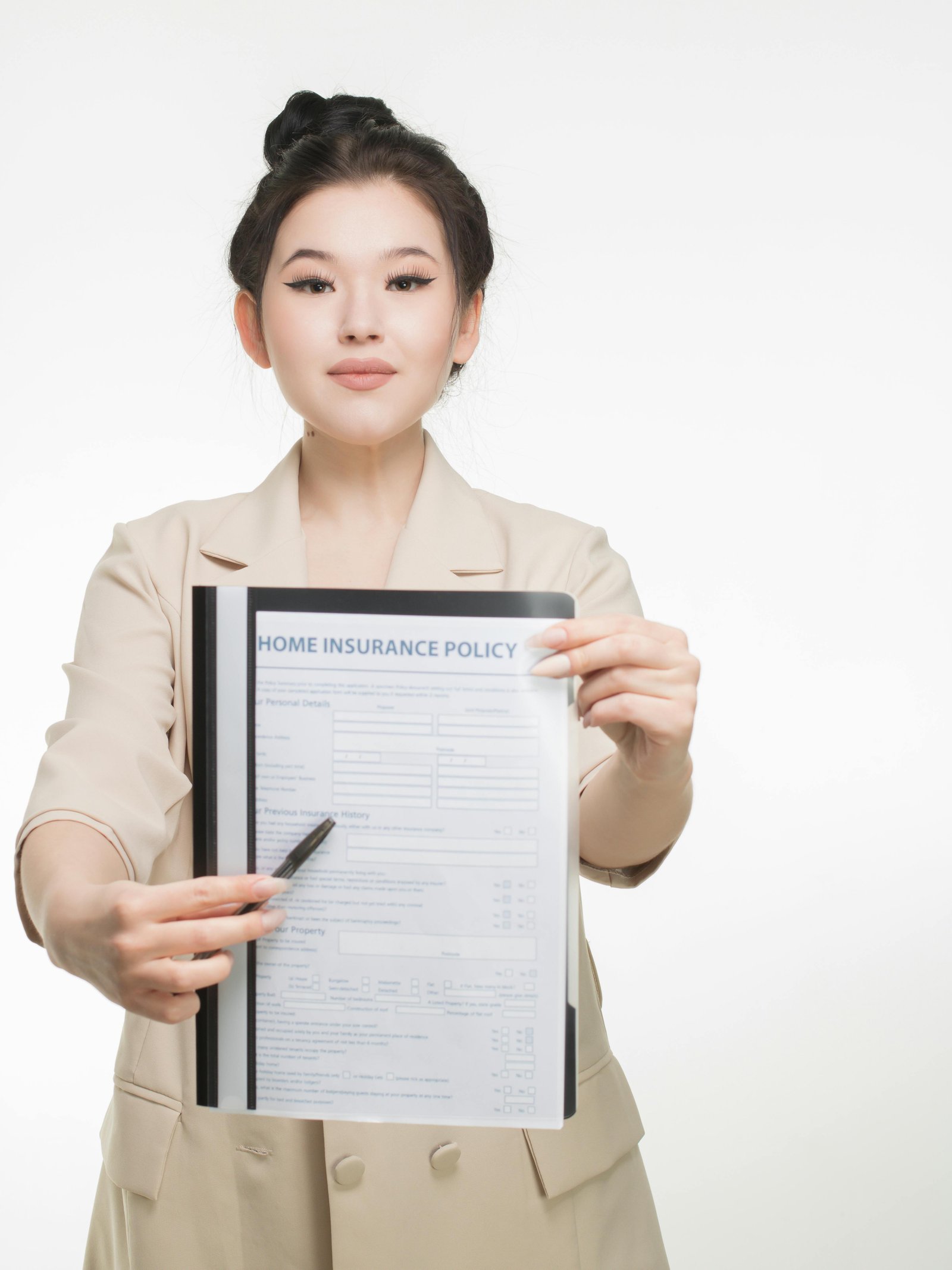 Medicare Supplement Plan G paperwork and a calculator on a desk as a person reviews coverage costs