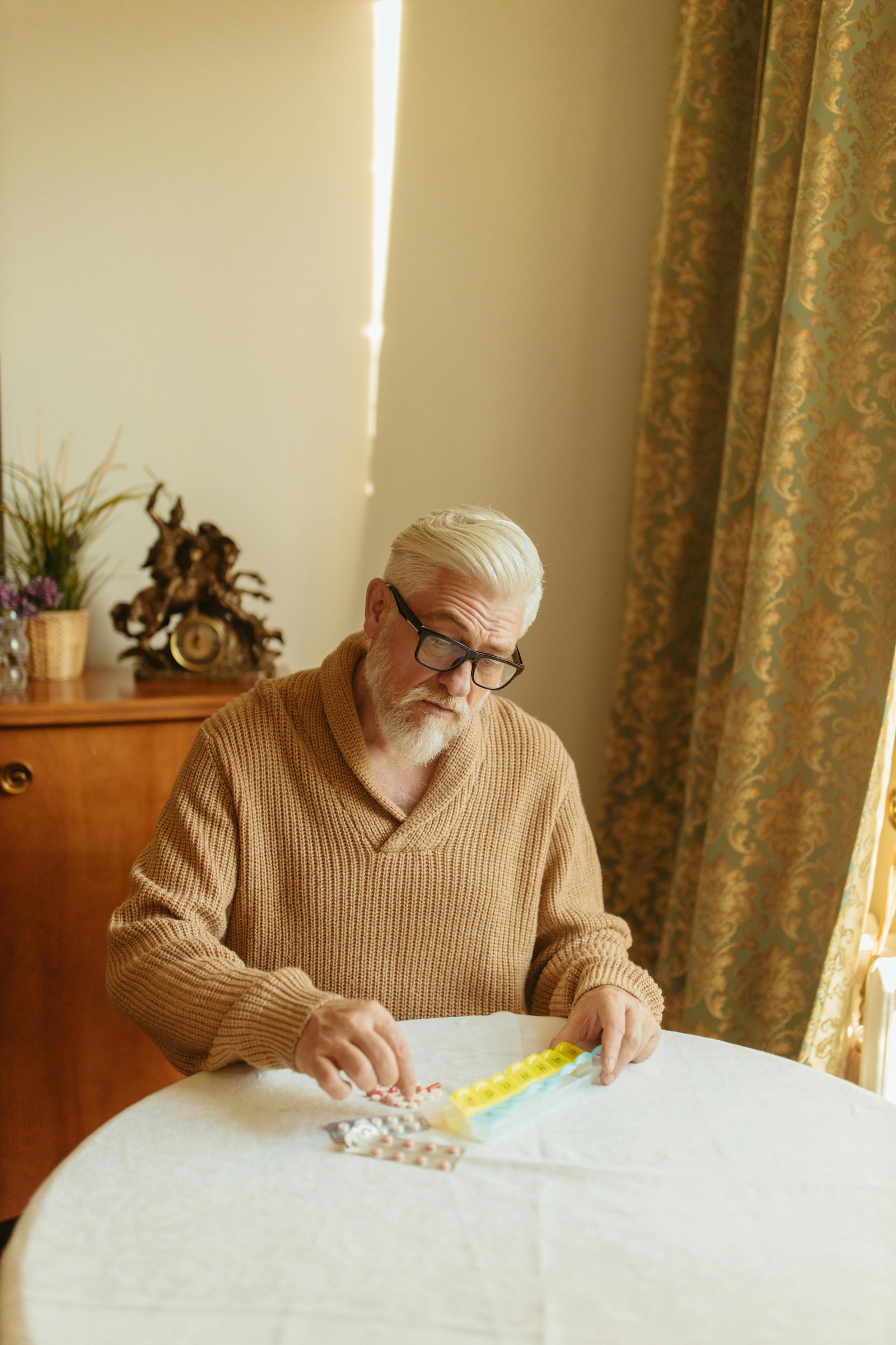 A caregiver assisting an older person at home, a common service paid for by long-term care insurance