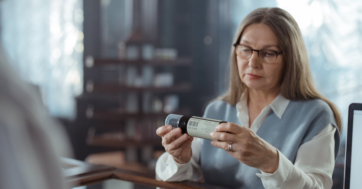 A pharmacist and patient reviewing options for how to lower prescription costs